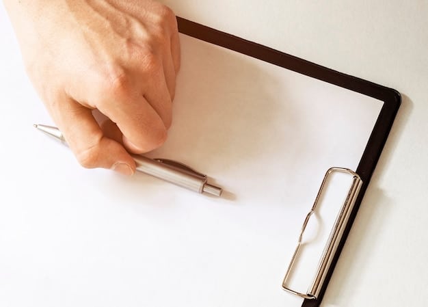 A close-up of someone reviewing a checklist of required documents with a pen in hand, highlighting the importance of preparation and attention to detail.