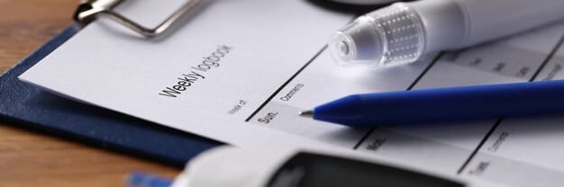 A close-up of an unemployment insurance application form, with a pen resting on top, highlighting the details and steps involved in applying for extended benefits.