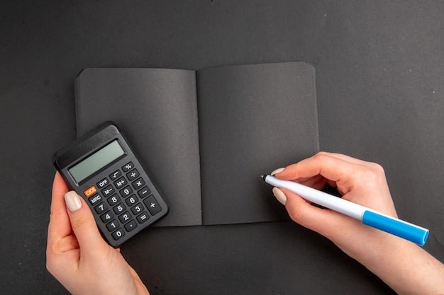 A close-up shot of a hand holding a calculator and a pen over a document titled 