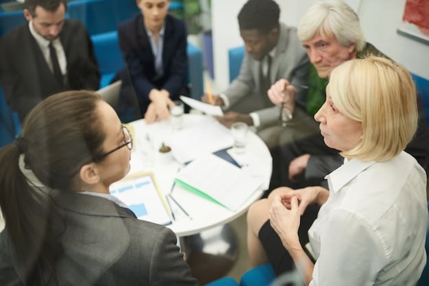 A group of advocates are shown collaborating around a table, discussing strategies and reviewing documents, symbolizing teamwork and collective action.