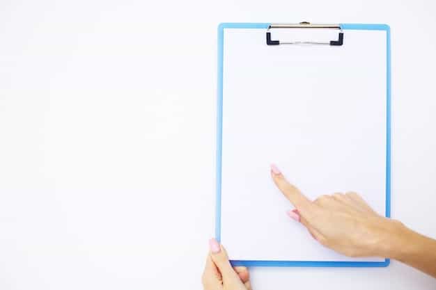 A hand pointing to a section of an application form that is left blank, with a red circle around the empty field to emphasize the incomplete information. The background shows other parts of the form with various questions and fields.