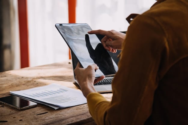 A person carefully reviewing a checklist on a tablet, with various application-related documents scattered on a desk around them, focused on verifying each item for completeness.
